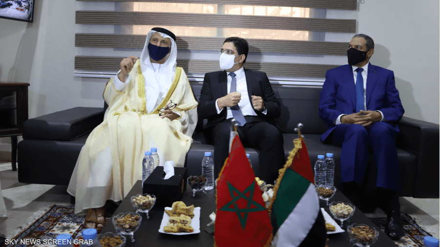 وزير الخارجية المغربي ناصر بوريطة، والسفير الإماراتي.