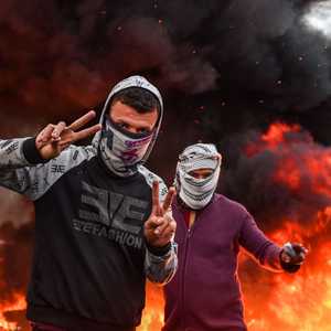 متظاهران في ساحة الحبوبي في الناصرية