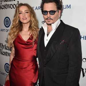 أرشيفية.. جوني ديب وأمبير هيرد