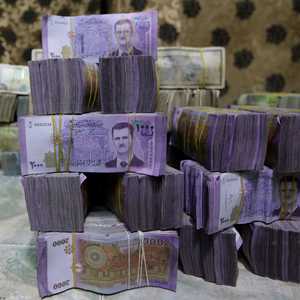 الليرة السورية ترتفع نحو 12 بالمائة مقابل الدولار