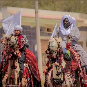 الرحالة الليبي يوسف الشريدي مع أصغر رحالة في العالم