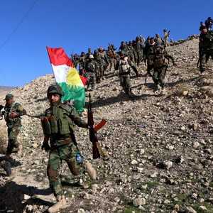قوات كردية في مدسنة سنجار بالعراق.