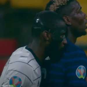 مدافع المنتخب الألماني أنطونيو روديغر يعض بوغبا