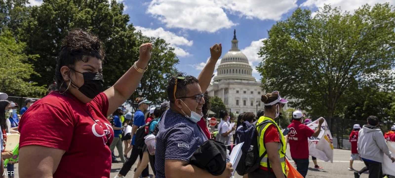 أميركيون يتظاهرون أمام الكونغرس - 24 يونيو 2021.