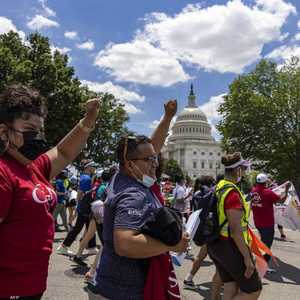 أميركيون يتظاهرون أمام الكونغرس - 24 يونيو 2021.