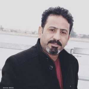 الشاعر الشعبي والناشط العراقي أحمد الزكروط