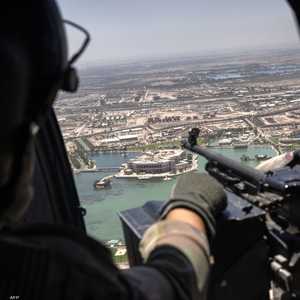 جندي أميركي على متن طائرة سمتية أميركية في بغداد. أرشيفية