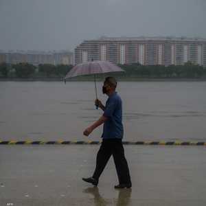 جانب من أمطار غزيرة شهدتها كوريا الشمالية العام الماضي.