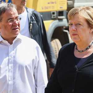 إنجيلا ميركل وأرمين لاشيت