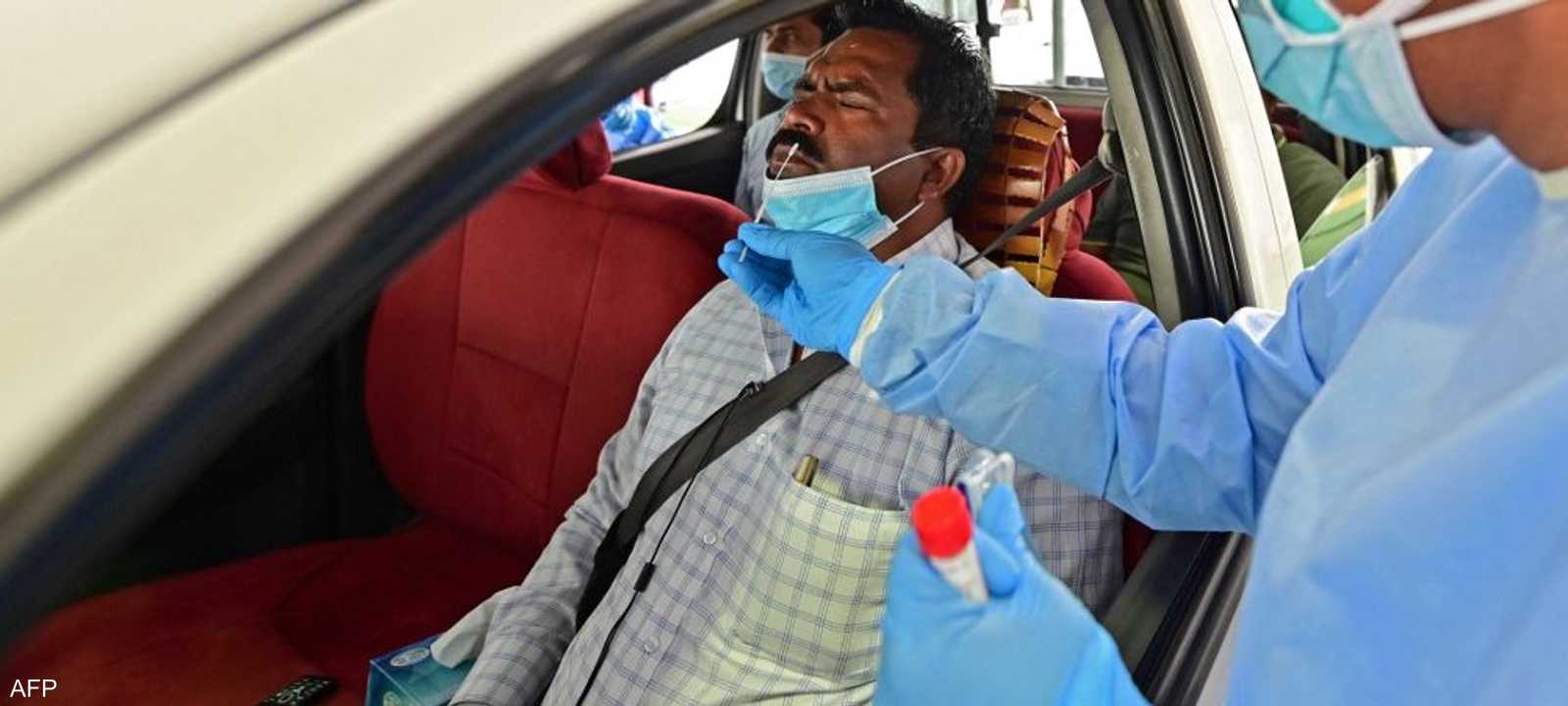 فحص كورونا في العاصمة الإماراتية أبوظبي.. أرشيفية