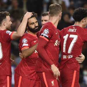 لاعبو ليفربول يحتفلون بالفوز على بورتو.