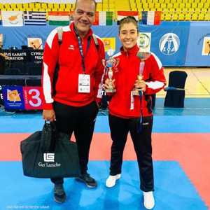 ملك أحمد ووالدها ومدربها أحمد عادل