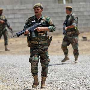 أفراد من قوات البيشمركة خلال تدريب شمالي العراق.