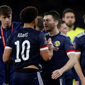 فرحة للاعبي منتخب اسكتلندا بالفوز على الدنمرك