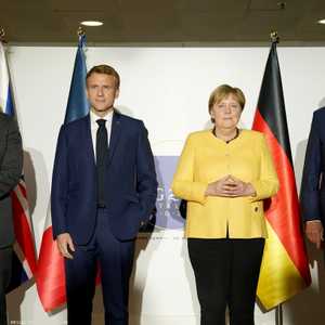 بايدن وميركل وماكرون وجونسون في لقاء سابق.