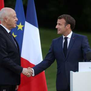 جانب من لقاء سابق بين ماكرون وقيس سعيد