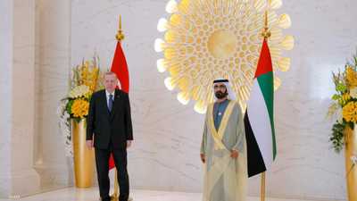 حاكم دبي لدى استقباله الرئيس التركي