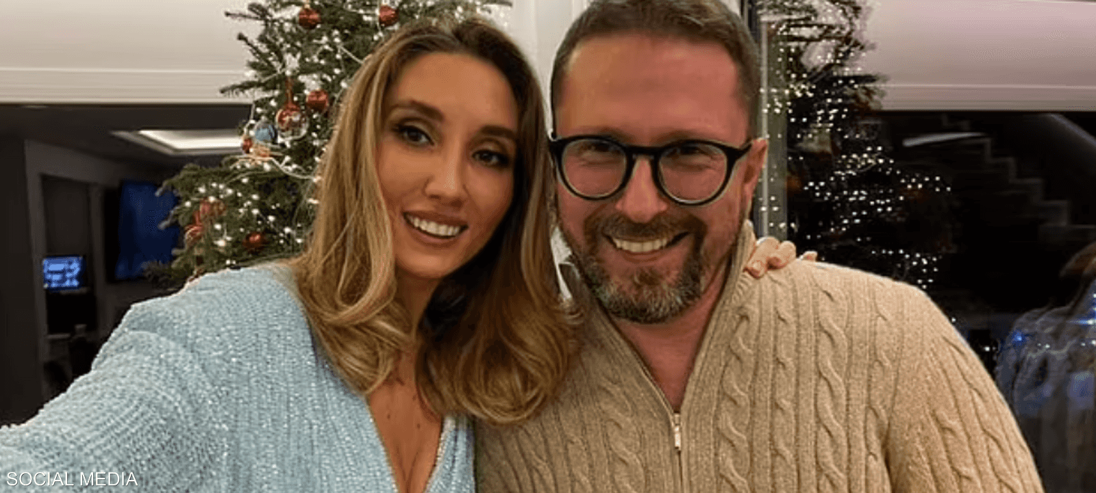 المدون الأوكراني مع زوجته