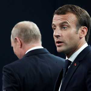 أرشيفية من لقاء جمع بين ماكرون وبوتن