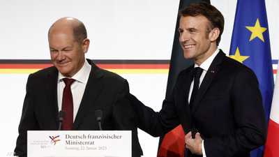 الرئيس الفرنسي ماكرون والمستشار الألماني شولتس