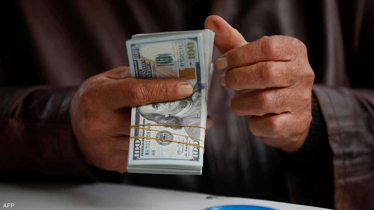 المركزي العراقي يحدد سعر صرف الدينار عند 1520 مقابل الدولار