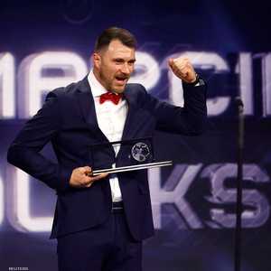 مارسين أوليكسي لدى تتويجه بالجائزة.