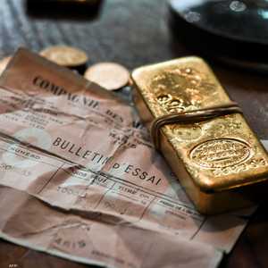 الذهب يتراجع مع انحسار أزمة المصارف