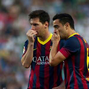 صورة أرشيفية لميسي وتشافي في برشلونة