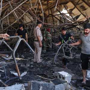 من آثار الحريق الذي شهده قضاء الحمدانية في نينوى