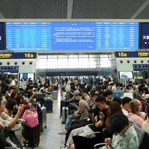 مسافرون يقبلون على السفر بقوة في الصين