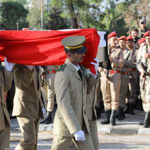 بدأت سوريا تشييع ضحايا الهجوم على الكلية الحربية بحمص