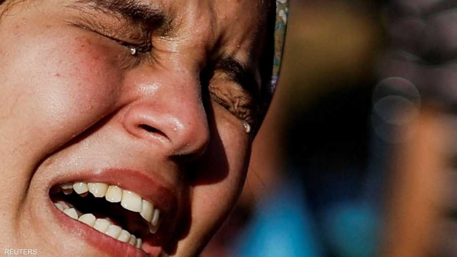 سيدة فلسطينية خلال جنازة أحد أقاربها قضى بقصف إسرائيلي لغزة