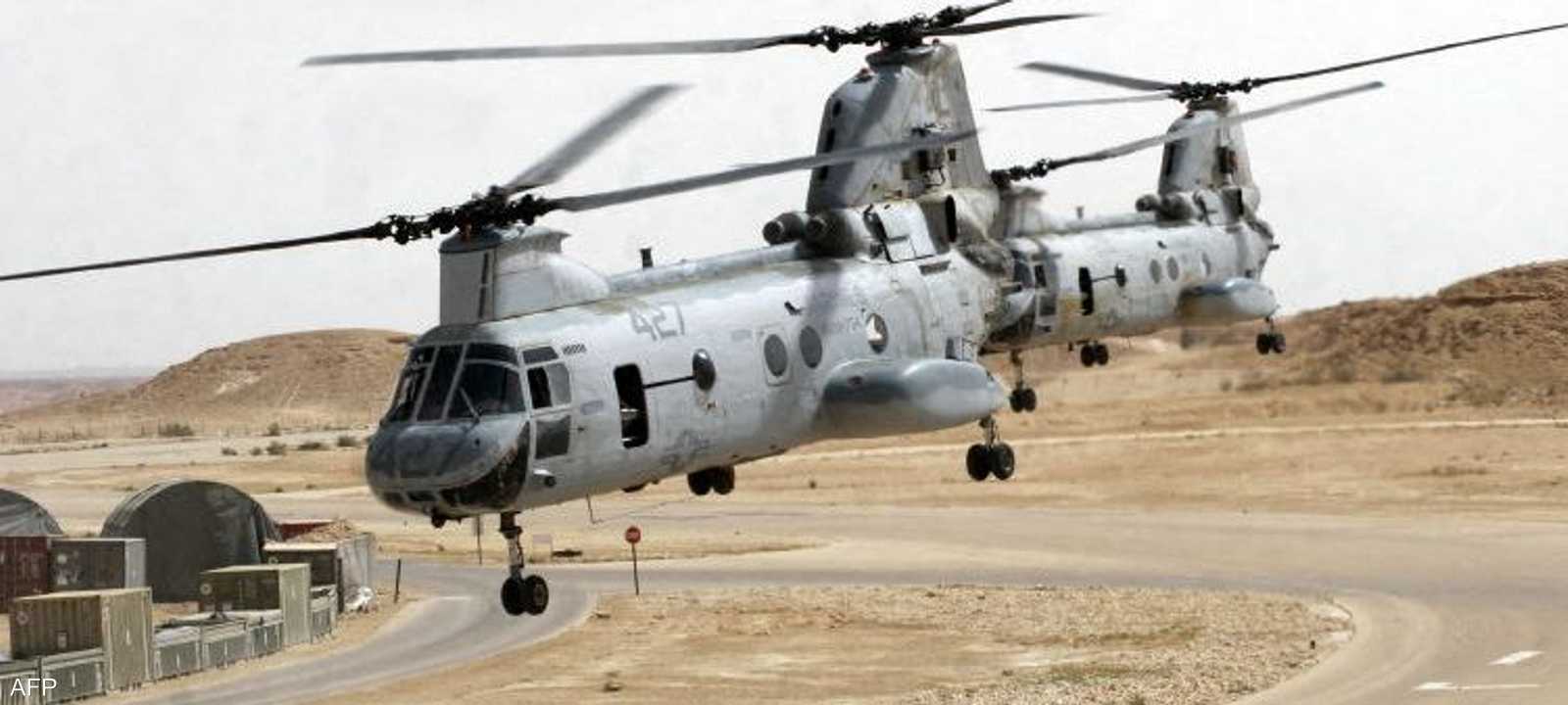 أرشيفية لطائرة أميركية تحلق فوق قاعدة عين الأسد الجوية