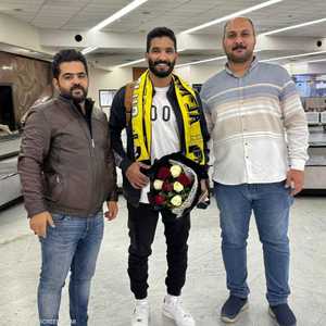 صالح جمعة عند وصوله إلى بغداد