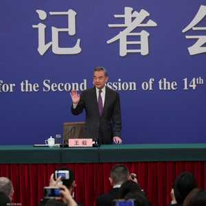 وزير الخارجية الصيني دعا لمؤتمر سلام شامل