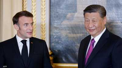 الرئيس الصيني شي جين بينغ والرئيس الفرنسي إيمانويل ماكرون