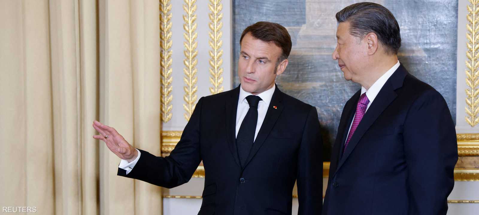 الرئيس الفرنسي ماكرون مع نظيره الرئيس الصيني شي في باريس