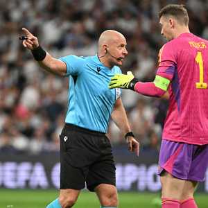 حكم اللقاء سيمون مارشينياك