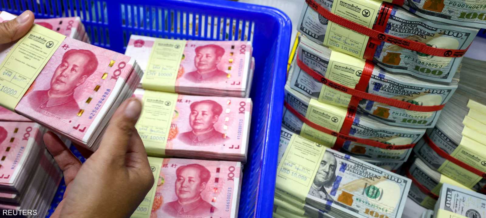 عملات - الدولار الأميركي مقابل اليوان الصيني