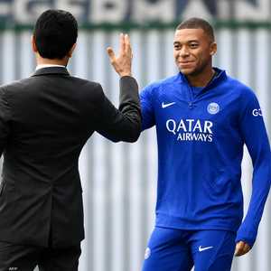 مبابي يصافح الخليفي - أرشيفية