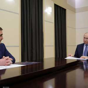 الرئيس الروسي فلاديمير بوتين رفقة أليكسي ديومين