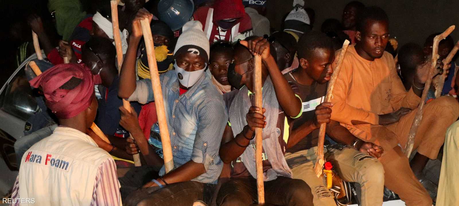 مهاجرون تم إنقاذهم بصدد ترحيلهم إلى ليبيا