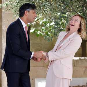 سوناك وميلوني خلال اللقاء