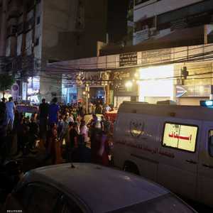 سيارات الإسعاف في موقع الضربة الإسرائيلية بالضاحية