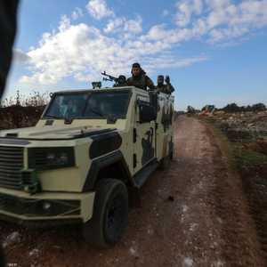 أرشيفية لمقاتلين من فصائل مسلحة في حلب