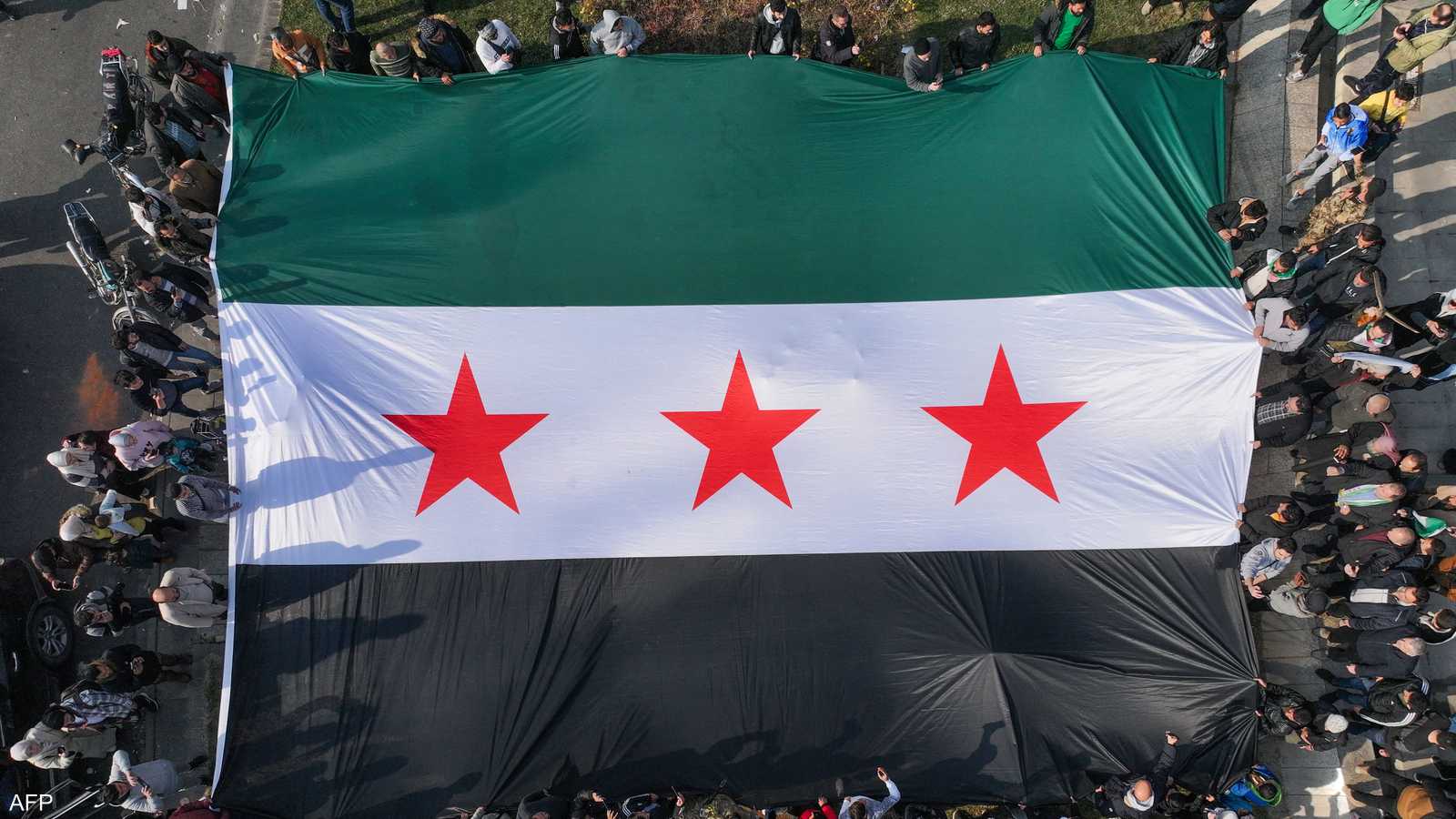 علم الاستقلال الذي اعتمدته المعارضة السورية