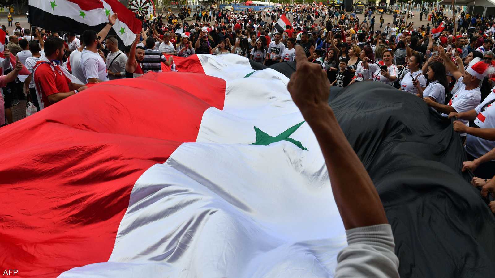 علم سوريا قبل سيطرة المعارضة المسلحة على دمشق في 8 ديسمبر 20