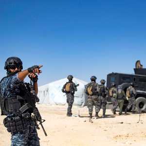 أرشيفية لقوات كردية في مخيم الهول