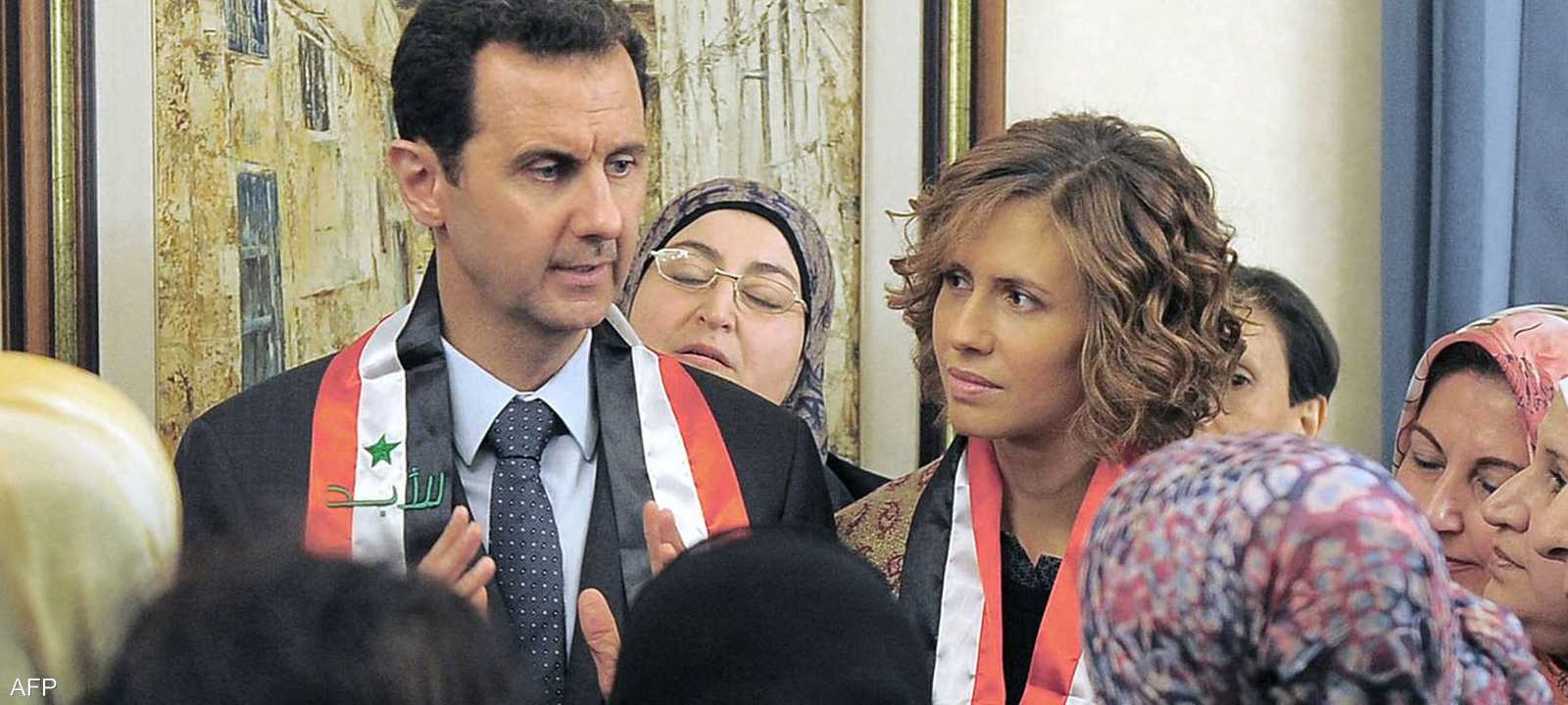 أرشيفية للرئيس السابق بشار الأسد وزوجته أسماء