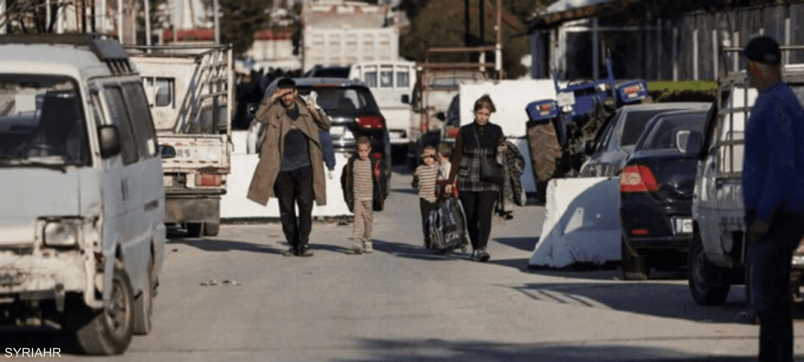 خروج العشرات من مطار حميميم